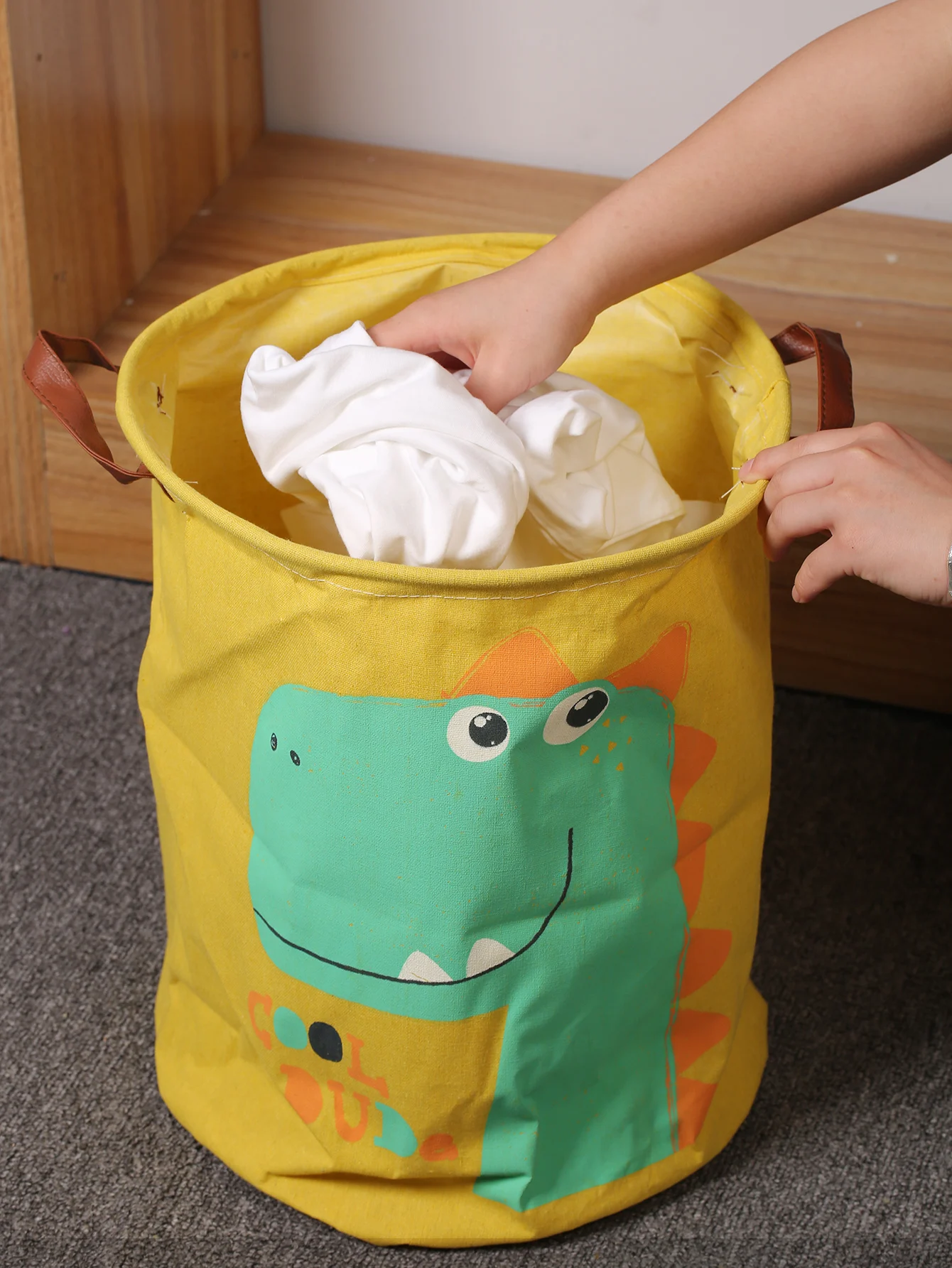 A foldable laundry basket for baby dinosaurs laundry basket clothes basket