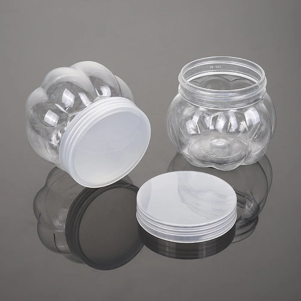 Description Picture 4 of item5/10Pcs Mini Candy Box Chrismas Candy Candy Holder Clear Glass Jars Lids Pet Pumpkin Jar Storage Rack Empty Candy Jar Kitchen