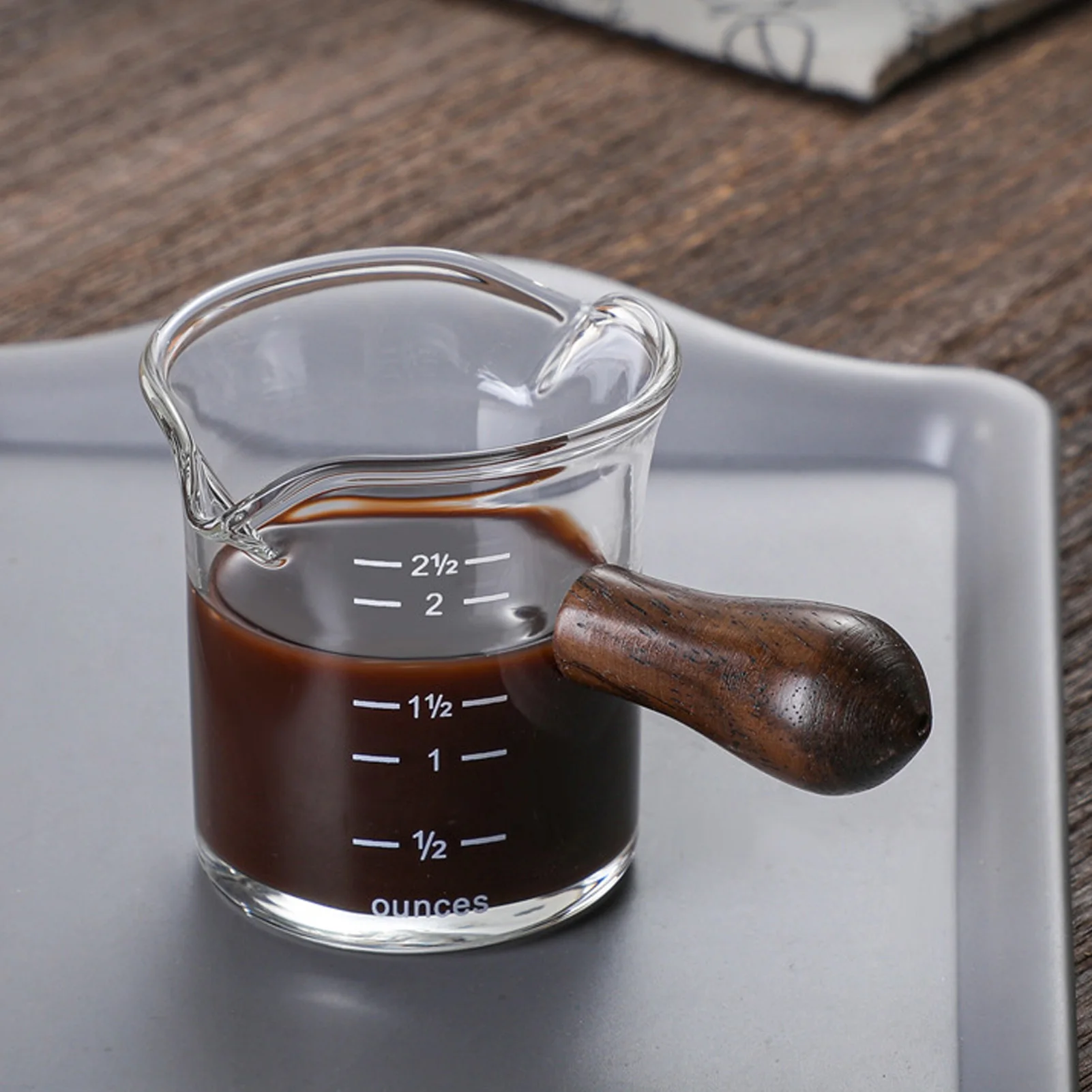 https://ae01.alicdn.com/kf/S0b2e87ec0ff1448bb7ae79403a4b9974y/Glass-Coffee-Measuring-Cup-Double-Spout-Espresso-Shot-Glass-With-Wood-Handle-Espresso-Shot-Glass-Espresso.jpg