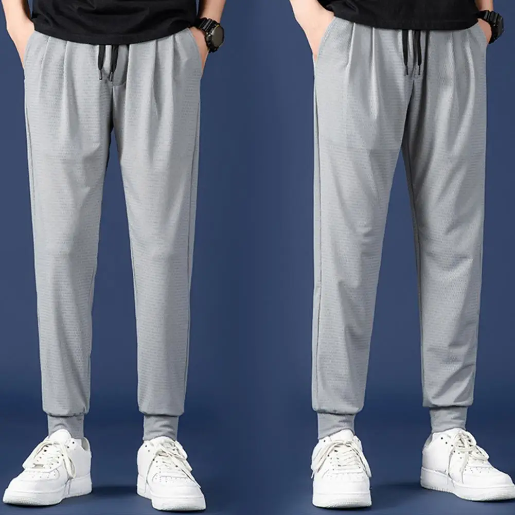 Men Ice Silk Sweatpants Elastic Drawstring Waist Pockets Sport Pants Breathable Mesh Thin Fitness Trousers Streetwear