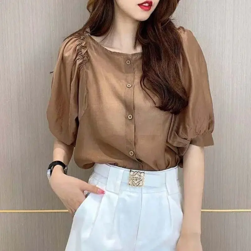 Stylish O-Neck Button Spliced Loose Fold Puff Sleeve Shirt Female Clothing 2023 Spring New Casual Tops Solid Color Korean Blouse