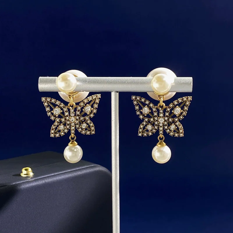 Donia Jewelry Fashion New Butterfly Titanium Steel Micro-Inlaid AAA Zircon Silver Needle Luxury Palace Pearl Earrings.