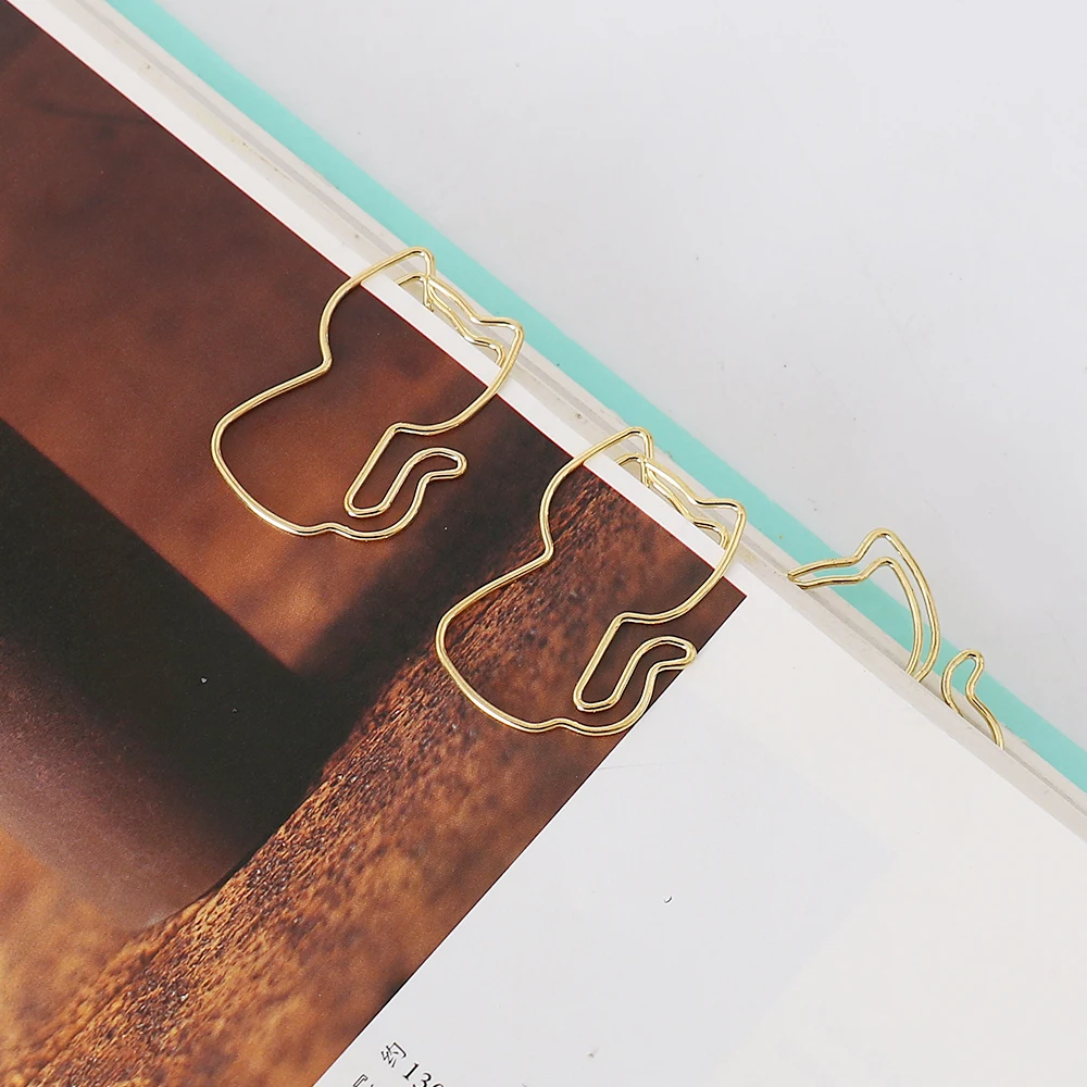 Рисунок 4 - креативные Золотые зажимы для бумаги