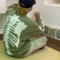 KAPITAL Hirata Hiroshi Back Bone Green Torn Hole Long Sleeved Loose Fitting Sweater for Men and Women's Fashion 1