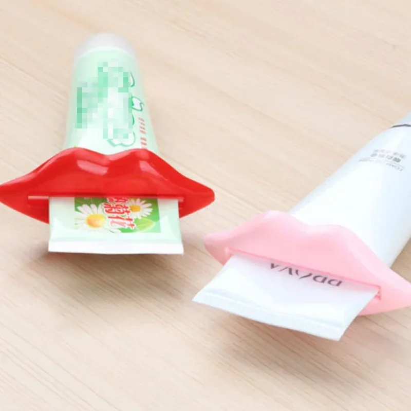 1Pcs Top Sale Sexy Hot Lip Kiss Bathroom Tube Dispenser Toothpaste Cream Squeezer Home Tube Rolling Holder Squeezer Random Color