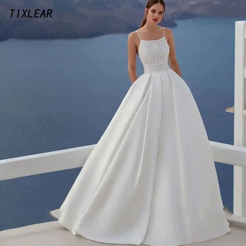

TIXLEAR Modern Wedding Dress Spaghetti Straps Scoop Neck Appliques Backless Floor Length Bridal Ball Gown Button Vestidos New