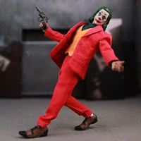 ⁦مجسم شخصية الجوكر (إصدار خواكين فينيكس) بملابس قماشية ومفاصل متحركة بطول 15 سم |  DC The Joker (Joaquin Phoenix) 1:12 Scale Action Figure with Fabric Clothing 15cm⁩ - الصورة ⁦3⁩