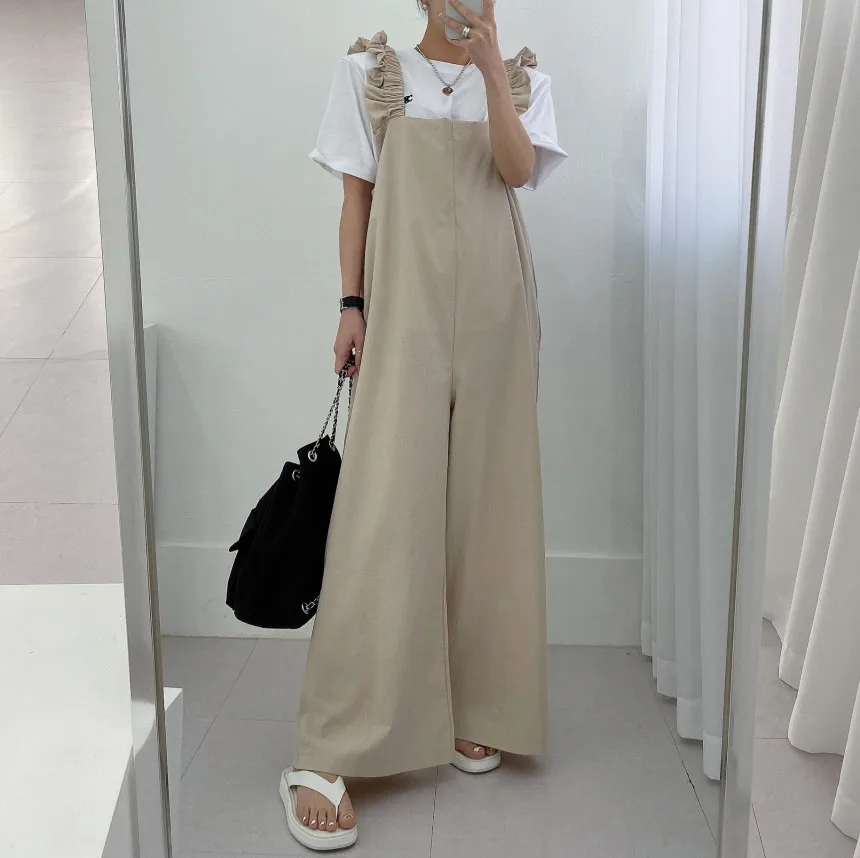

Senior sense wooden ear side suspenders women 2023 spring new design sense slim high waist wide leg casual pants jumpsuit