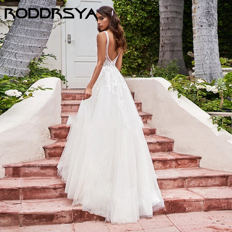 RODDRSYA Sexy V-Neck Backless A Linha Vestido De Noiva Romântico Tule Apliques Vestido De Noiva Elegante Spaghetti Straps Noiva Festa Sexy V-Neck