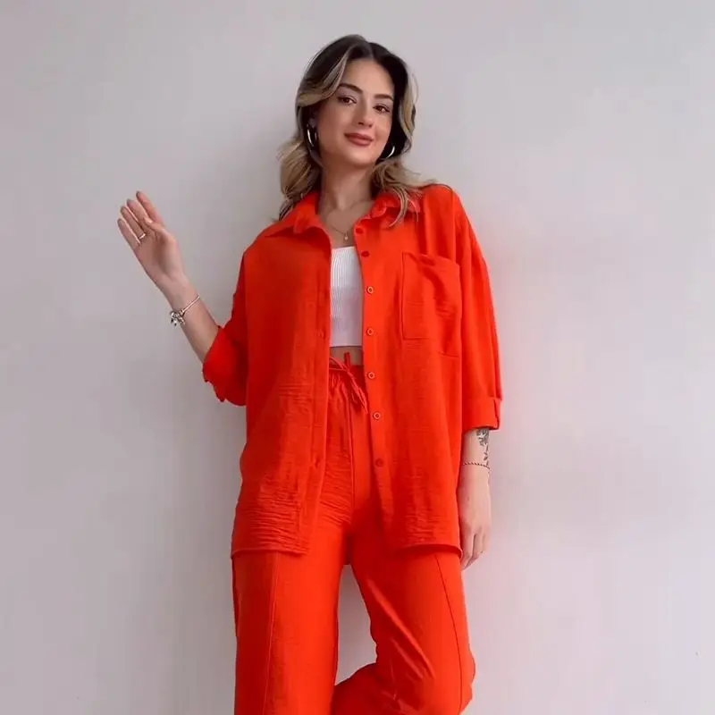 

Женский однотонный костюм из двух предметов, рубашка с длинным рукавом и прямые брюки с одним рядом пуговиц, весна-лето