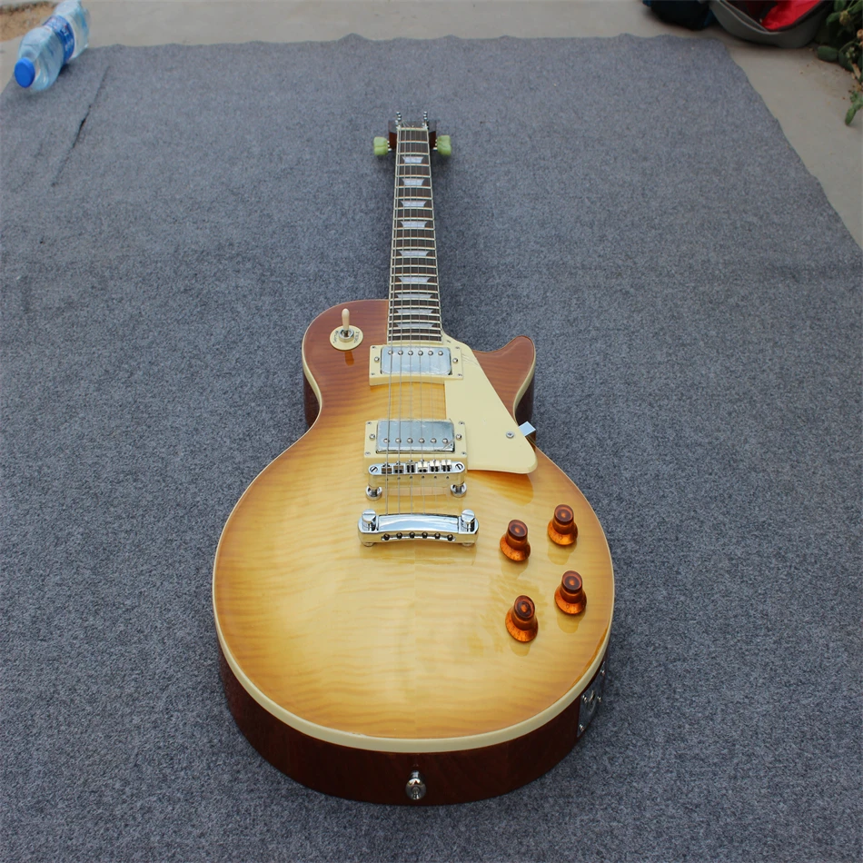 

Free shipping, high quality electric guitar, brown and yellow color, flame tiger print, silver hardware, can be customized