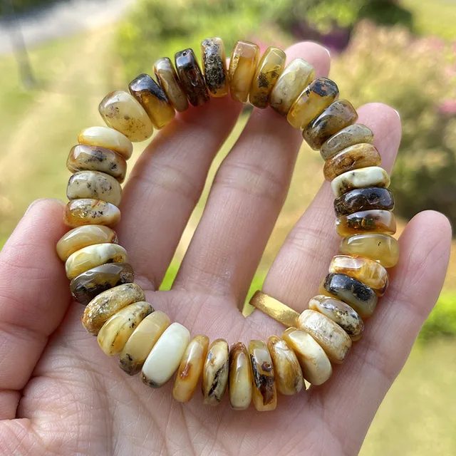 The Fossilized Baltic Amber Bracelet - Hammacher Schlemmer