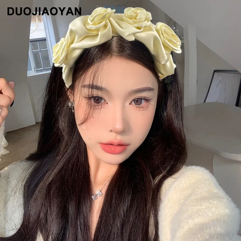 

Korean version of the new ins style fabric rose flower pleated wide-brimmed hairband temperament pressure high-cranial top hairb