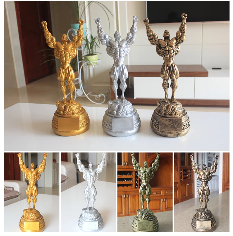 Fitness muscle man sets up bodybuilding sports competition trophies, boxing figures, statues