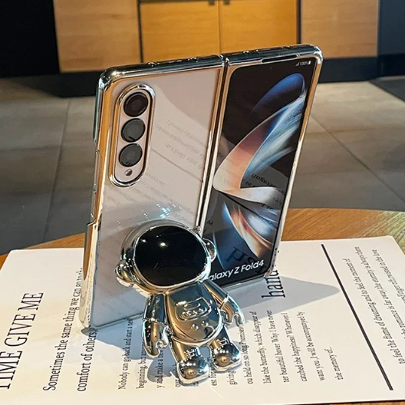 Coque de téléphone transparente électroplaquée astronaute pour Samsung Galaxy Z Fold 6 5 4 3 Fold6 Fold5 Fold4 Fold3 Coque transparente avec béquille_voghion.com
