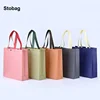 StoBag 25pcs Non-woven Tote Bags Shopping Shoulder Fabric Eco Woman Storage Reusable Portable Pouches Custom Logo(Extra Fee) 1