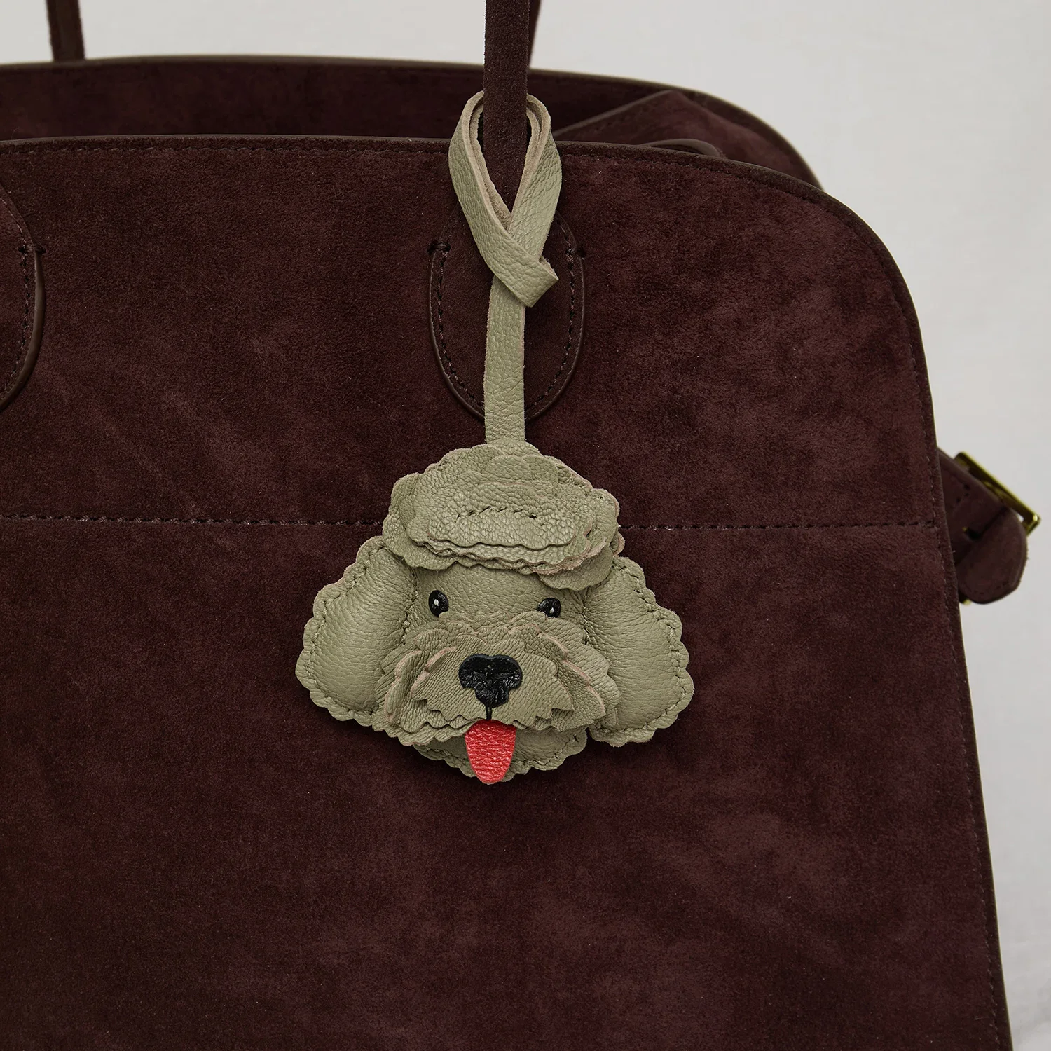 Teddy dog leather charm side view