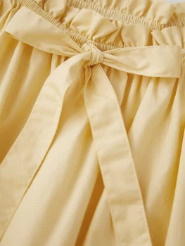 Elegant Maternity Dress with Flattering Empire Waist and Flowy Ruffled Hemline Ideal for Stylish Moms-to-Be in Summer 2