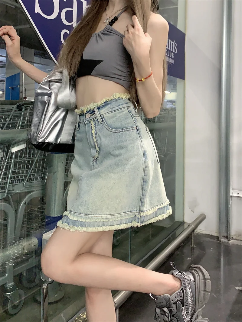 2023 New Vintage Denim Half Skirt Women's Spring Design High Waist Slim Tassel A-line Wrapped Hip Short Skirt