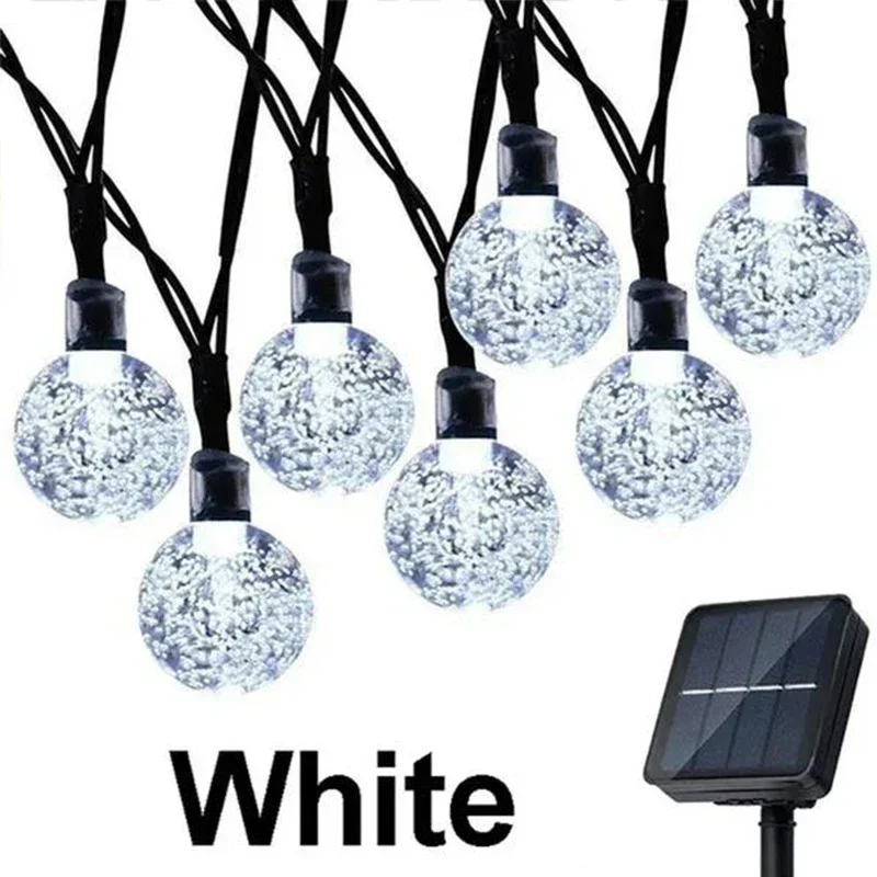 thumbnail image 1 of Guirnalda de luces solares de 200 LED para exteriores, guirnalda de luces navideñas de cristal, 8 modos, resistente al agua, para patio, decoración de fiestas en el jardín, 1 of 5
