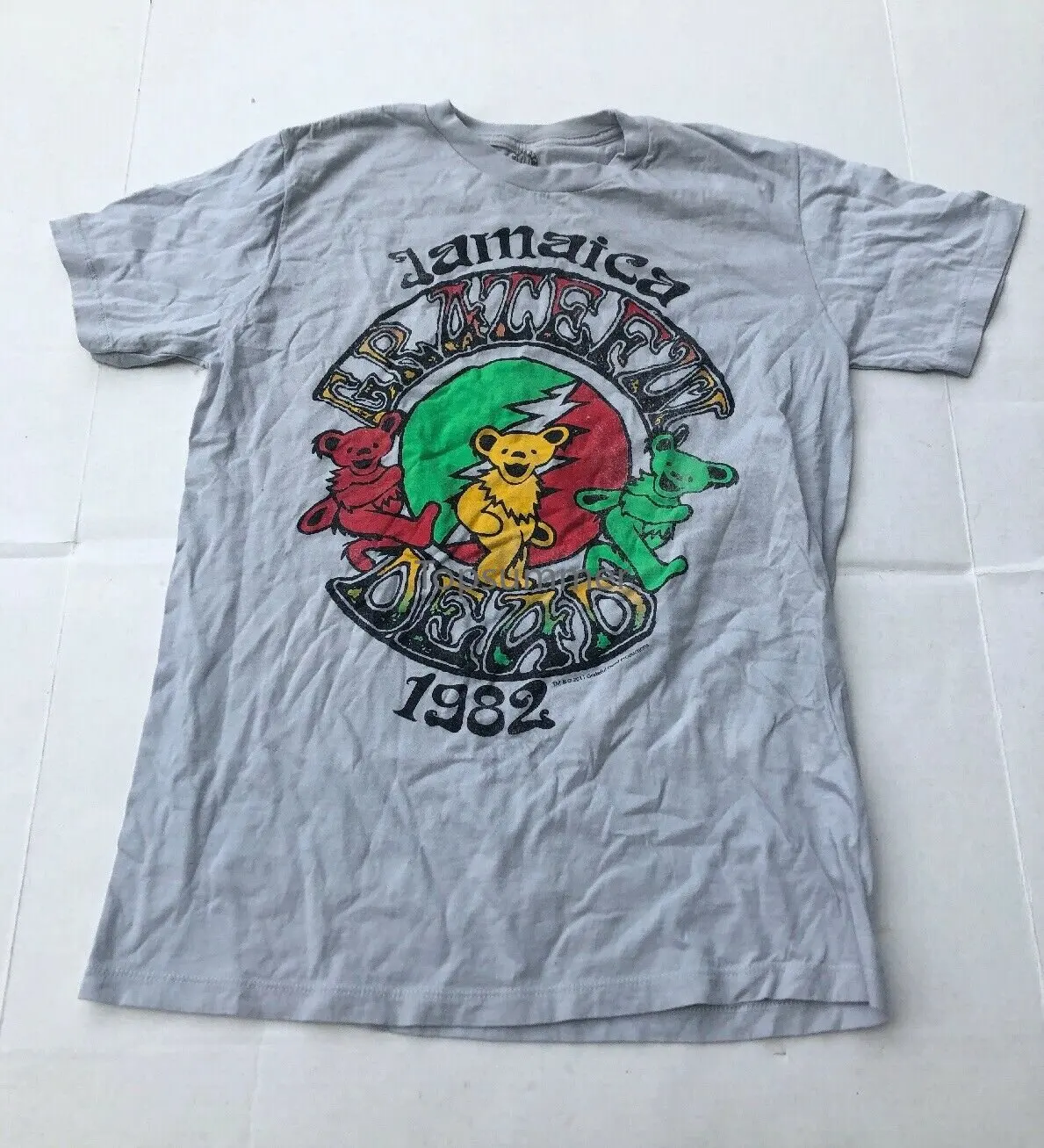

Reprint 2011 Jamaica 1982 Grateful Dead Band Rock Tee T Shirt Bear Rasta Medium