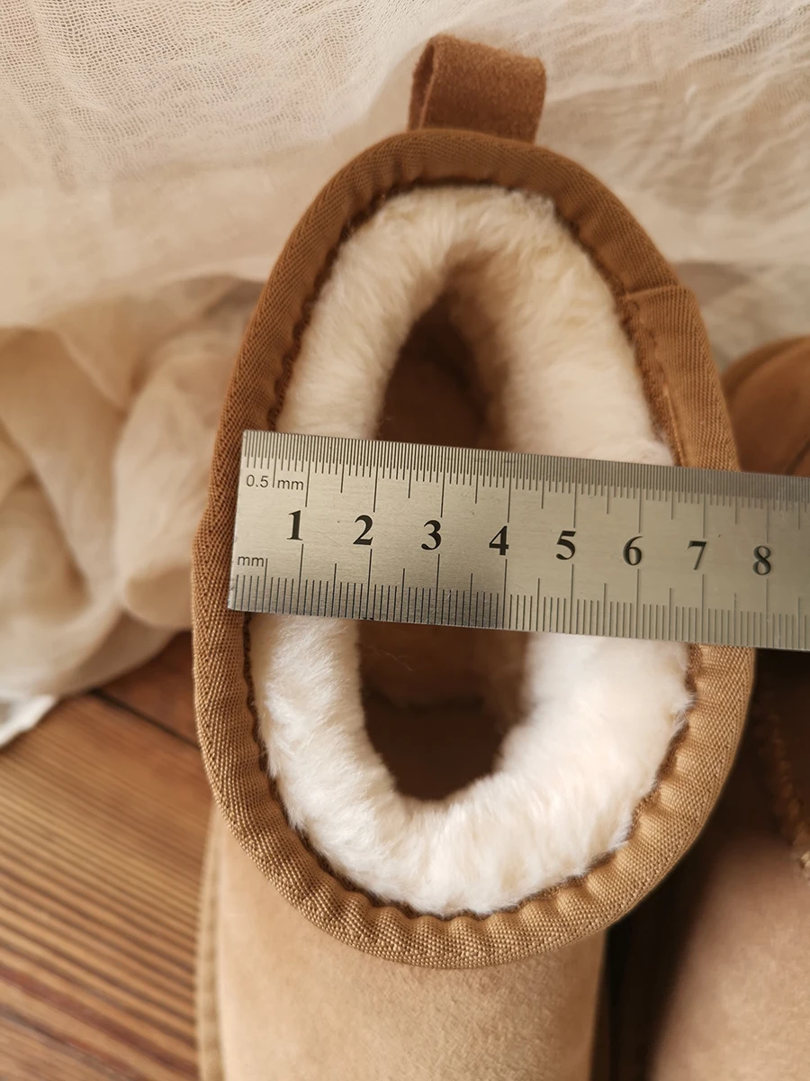 Women's genuine leather snow boots Winter warm cotton shoes Thickened anti slipShoes to prevent cold weather Low short tube Popu