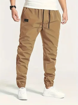 2025 NUOVA Primavera Autunno Pantaloni da uomo slim sportivi Pantaloni da jogging casual Pantaloni da uomo in tinta unita Pantaloni sportivi giornalieri in tessuto sottile 1