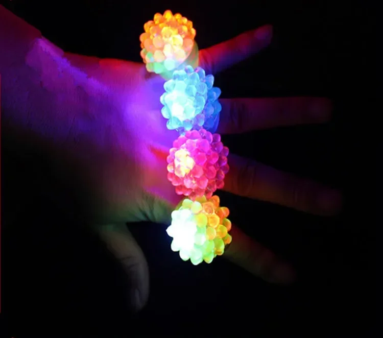 

[Funny] 50pcs/lot Flashing LED Light Up Toys Bumpy jelly Rings toy luminous Strawberry model ring girl evening of adornment gift