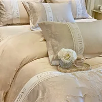 Ensemble de quatre pièces en coton léger et luxueux 60, housse de couette haut de gamme, drap de lit, matelas, literie 2