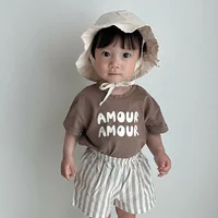 Enfants été mode lettres imprimer t-shirts bébé garçons solide T-Shirt enfants blanc haut en coton vêtements filles t-shirt style décontracté 2-7 ans 5