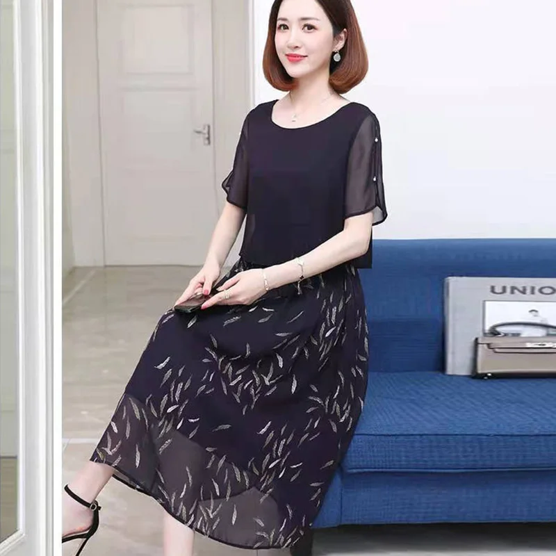 

Fashion O-Neck Printed Fake Two Pieces Chiffon Floral Dress Women's Clothing 2024 Summer New Loose Commuter Short Sleeve Dress