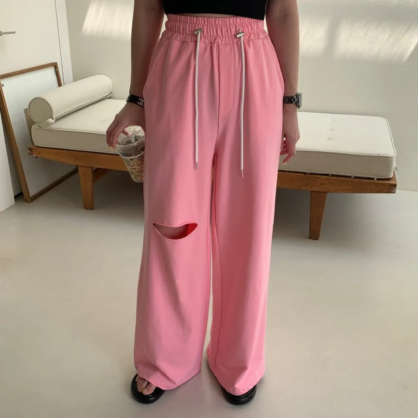 

Летняя одежда, новинка 2023, Корейская версия, однотонные Свободные повседневные брюки с эластичным поясом и дырками, женские брюки