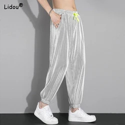 2023 New Summer Fashion Simple Loose Casual Super Oversized Elastic Waist Strap Pocket Strap Feet Hanging Ice Silk Guard Pants