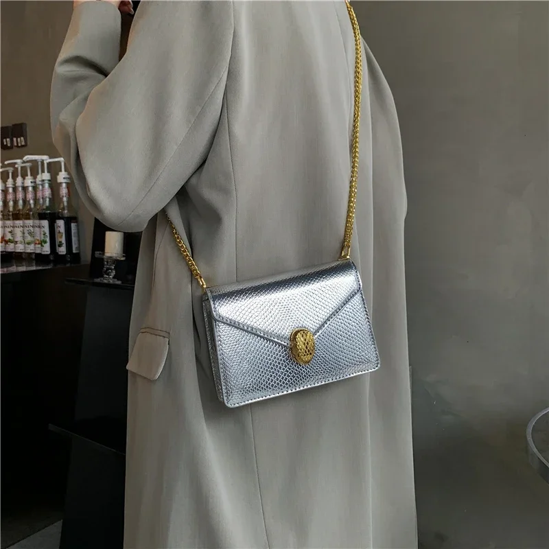 

2024 New Fashion Luxury Women Lady Shoulder Bag Serpentine Handbag Metallic Shoulder Girdle Snake Metal Logo Cross Body Bag