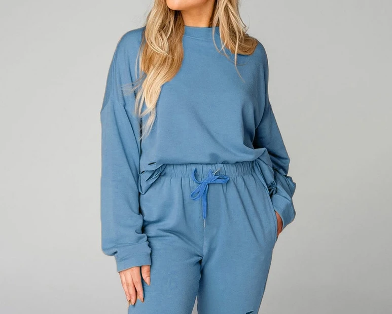 

Solid Color Pierced Round Neck Casual Long Sleeved Sweater and Pants Set, New Fashion Hot Selling Women's Clothing 2023