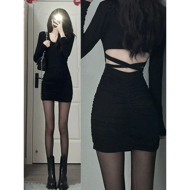 Pure wind spice girl long-sleeved dress female fall fashion niche design sense backless chic thin black hip skirt