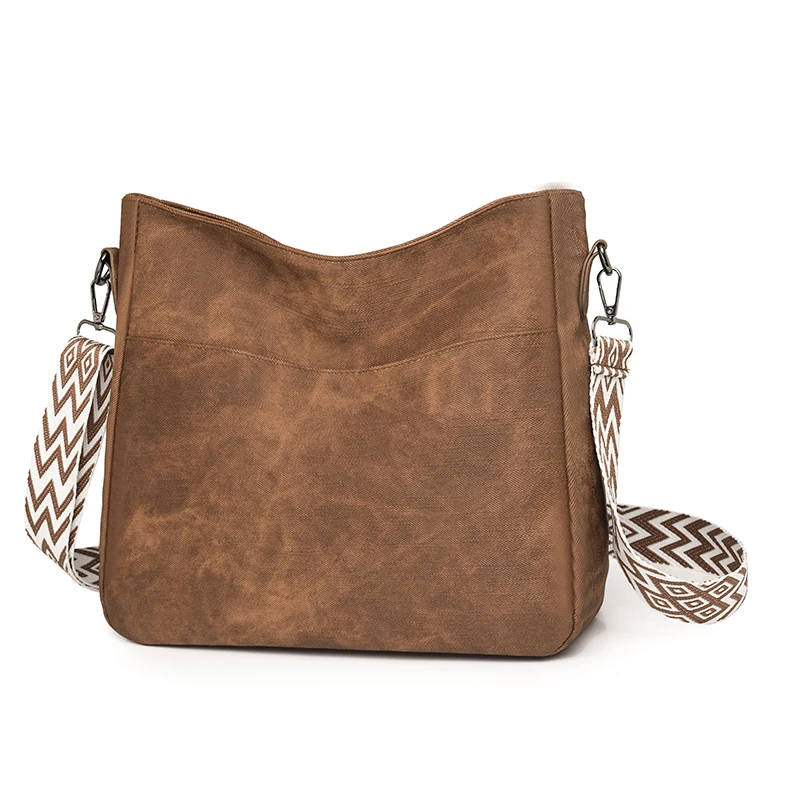 The women's single-shoulder crossbody bag is crafted from premium fabric and refined craftsmanship, featuring a minimalist and s