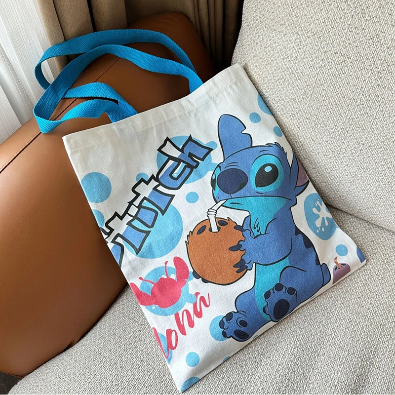 

Disney Student Versatile Stitch Cartoon Canvas Bag Large Capacity Book Bag Handbag Going Out Mom Commuting Bag Gifts Girls Toys