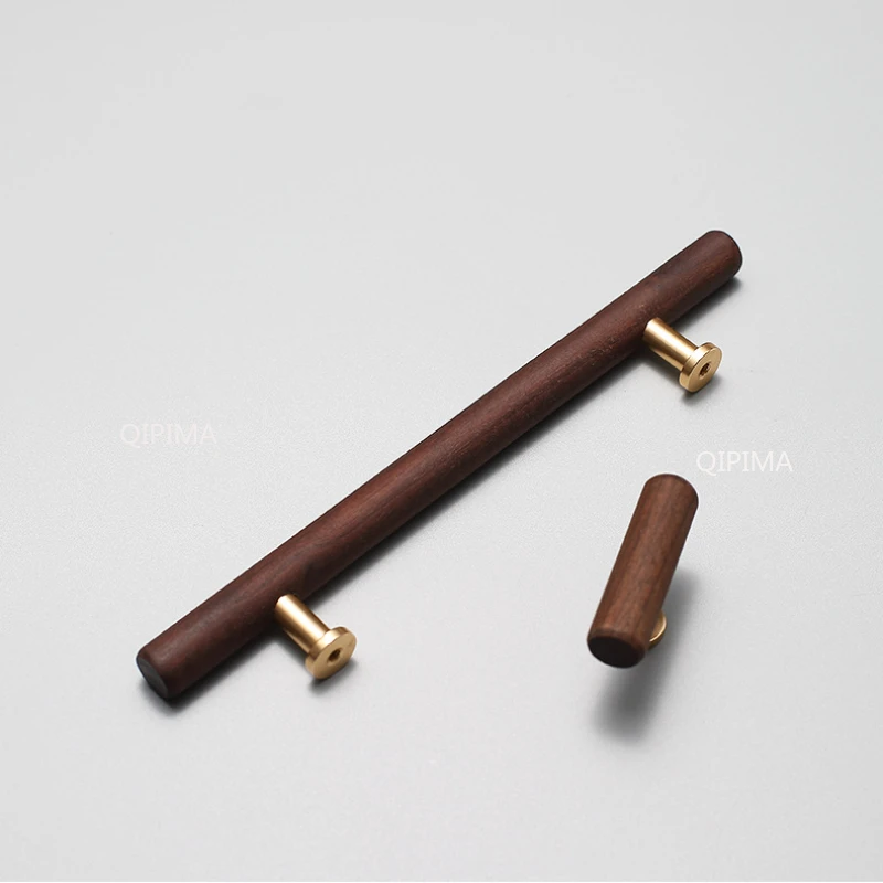 Solid brass handle with wood center. main image 1