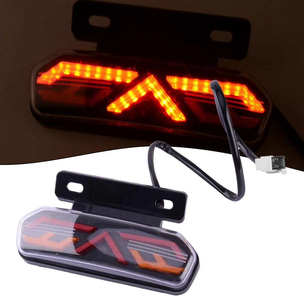 

Universal Motorcycle LED Rear Tail Brake Light Turn Signal Indicator Lamp 12V Plastic&Metal Red&Amber Light Color