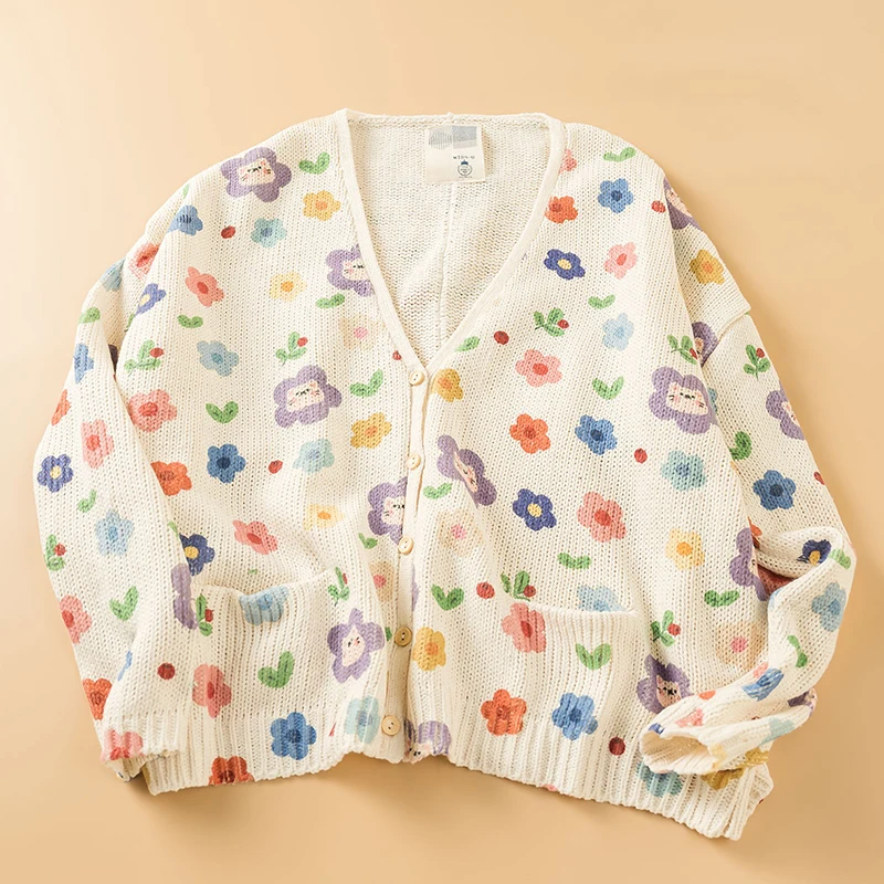 

Женский вязаный кардиган с V-образным вырезом и большими карманами