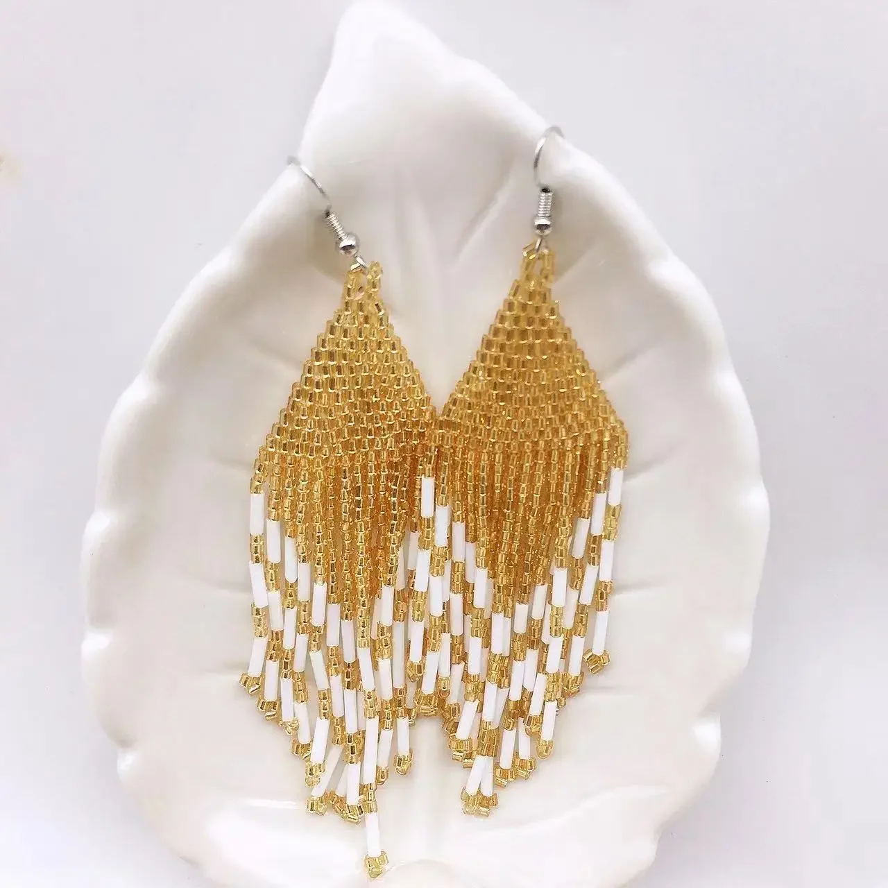 

Fringe Earrings Hand knitting Beading Bohemia Simple Versatile Bicolor fashion geometry alloy ma'am Rice Bead Earrings