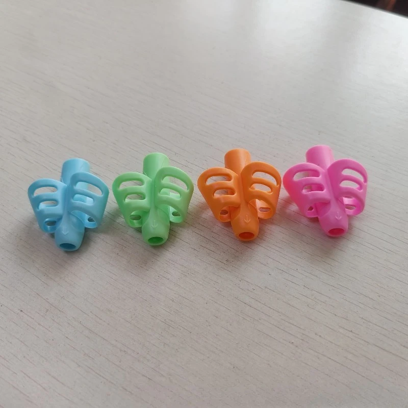Children's Double Finger Grip Writing Aid - Soft Rubber Pencil Holder for Correcting Writing Posture  Home Educational Tool