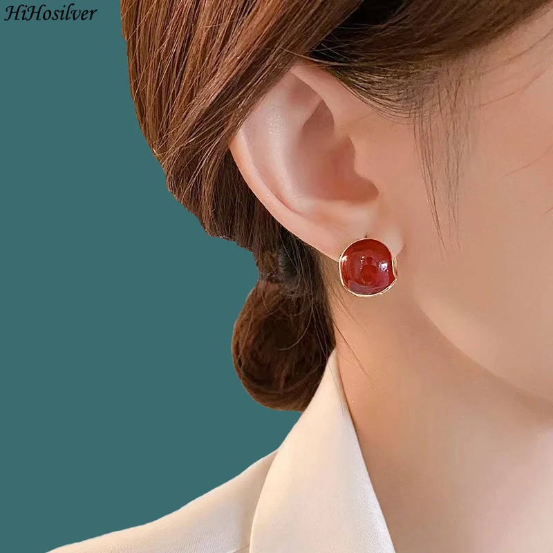 

HiHosilver 925 Silver Needle New Women's Fashion High-quality Jewelry Hollow Ball Hoop Earrings HS0124