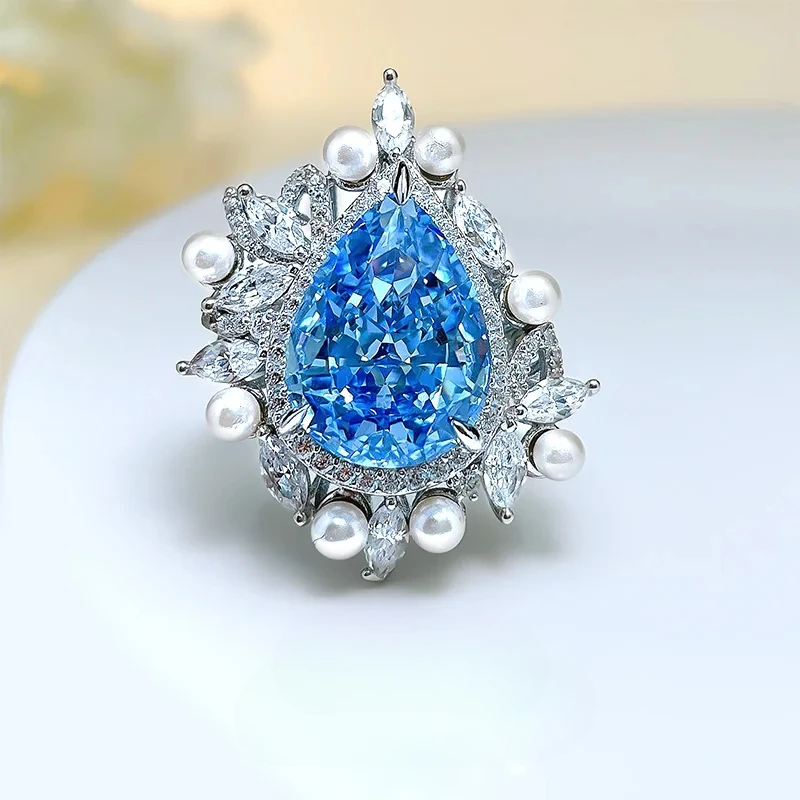 

Sea Blue Treasure Ring Unique Light Luxury High Carbon Diamond 925 Silver Water Drop Pear shaped Wedding Jewelry Wholesale