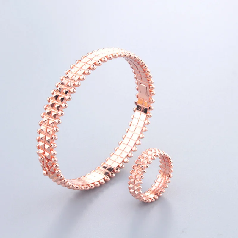 

Donia Jewelry New Fashion Creative Double-Row Smooth Rivet Titanium Luxury Palace Bracelet Ring Set
