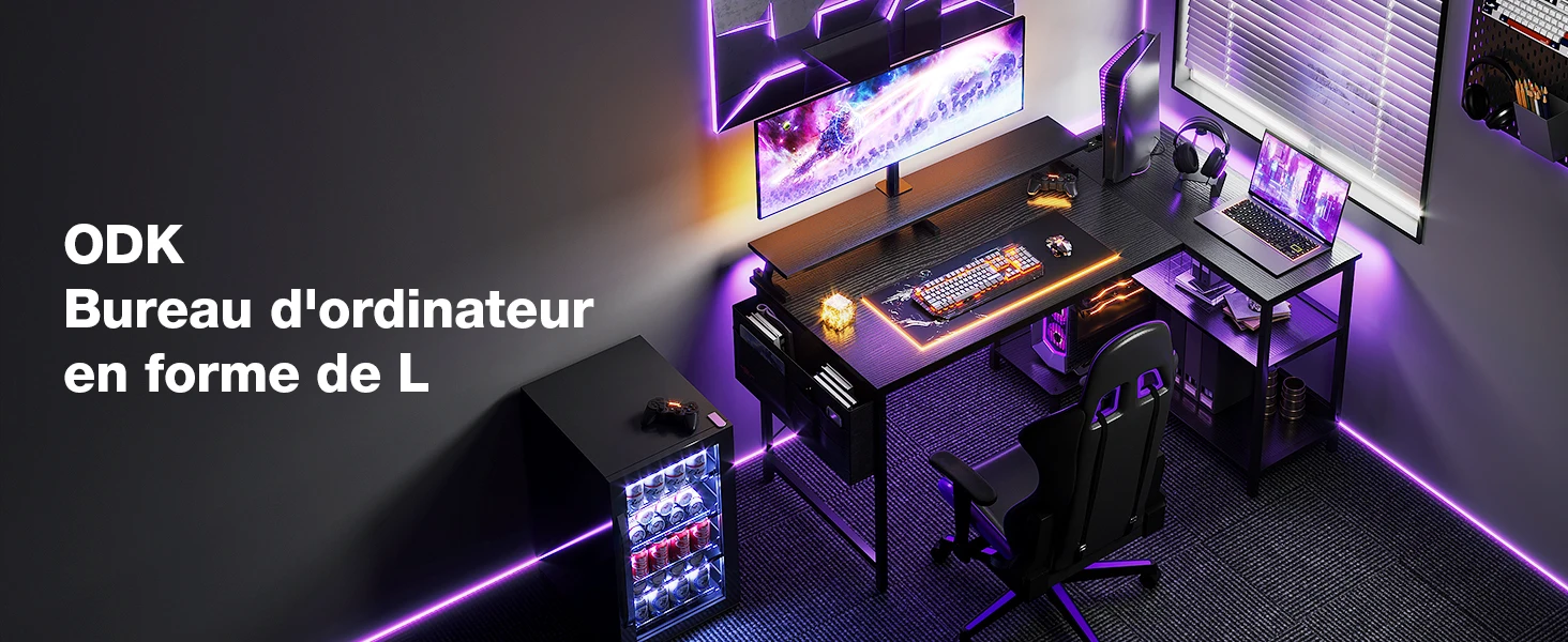 L-shaped with purple LED lighting, multiple monitors, a keyboard, and gaming accessories in a dimly lit room