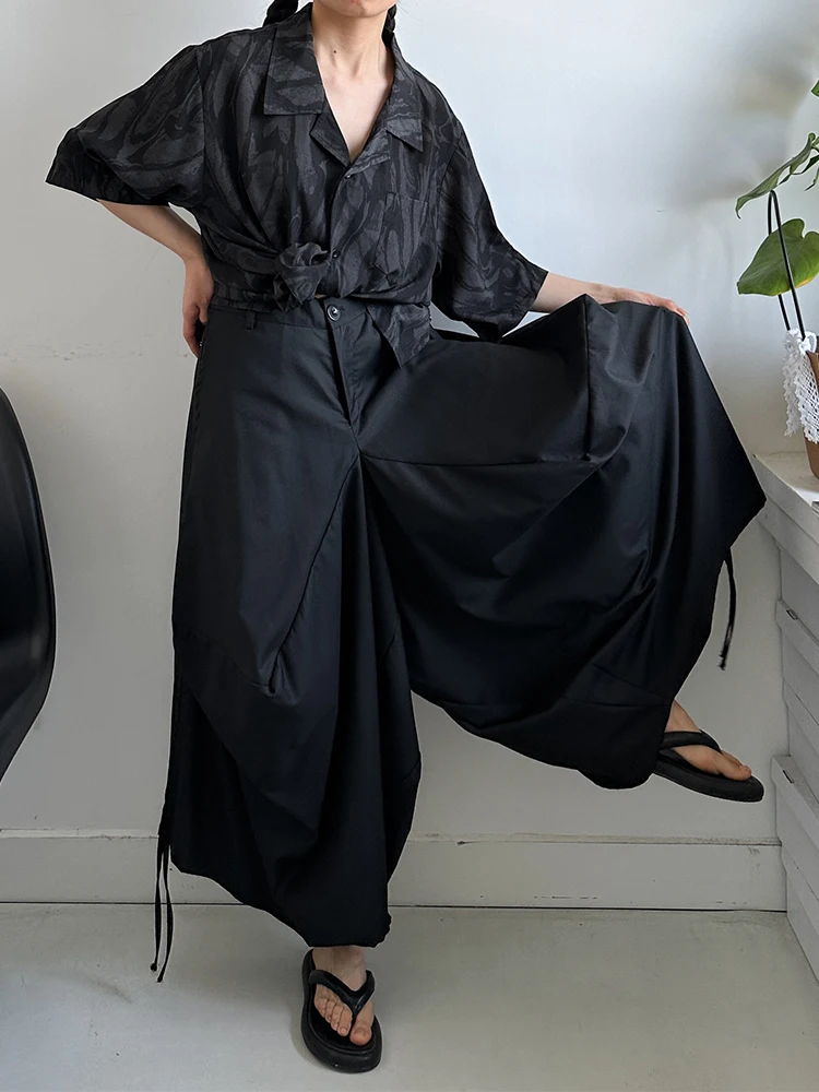 [EAM] High Elastic Waist Black Irregular Bandage Shaped Wide Leg Pants New Trousers Women Fashion Spring Autumn 2026 1DJ1234