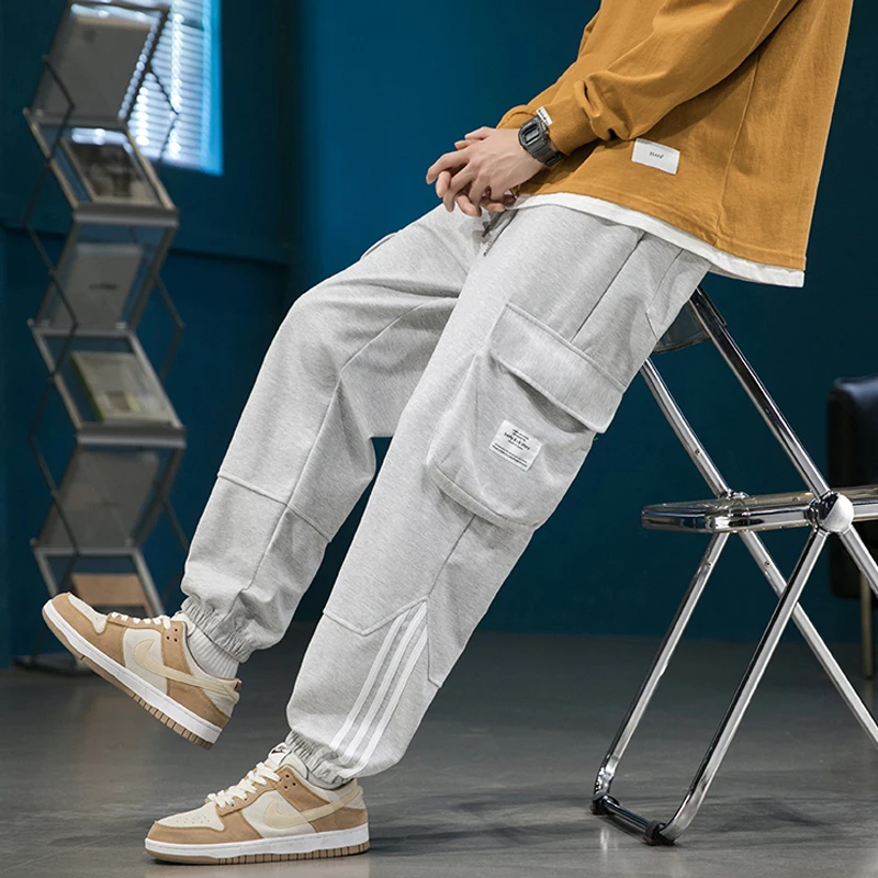 

Новинка Весна 2023 Модные полосатые брюки молодежные Удобные однотонные разноцветные свободные брюки с принтом универсальные