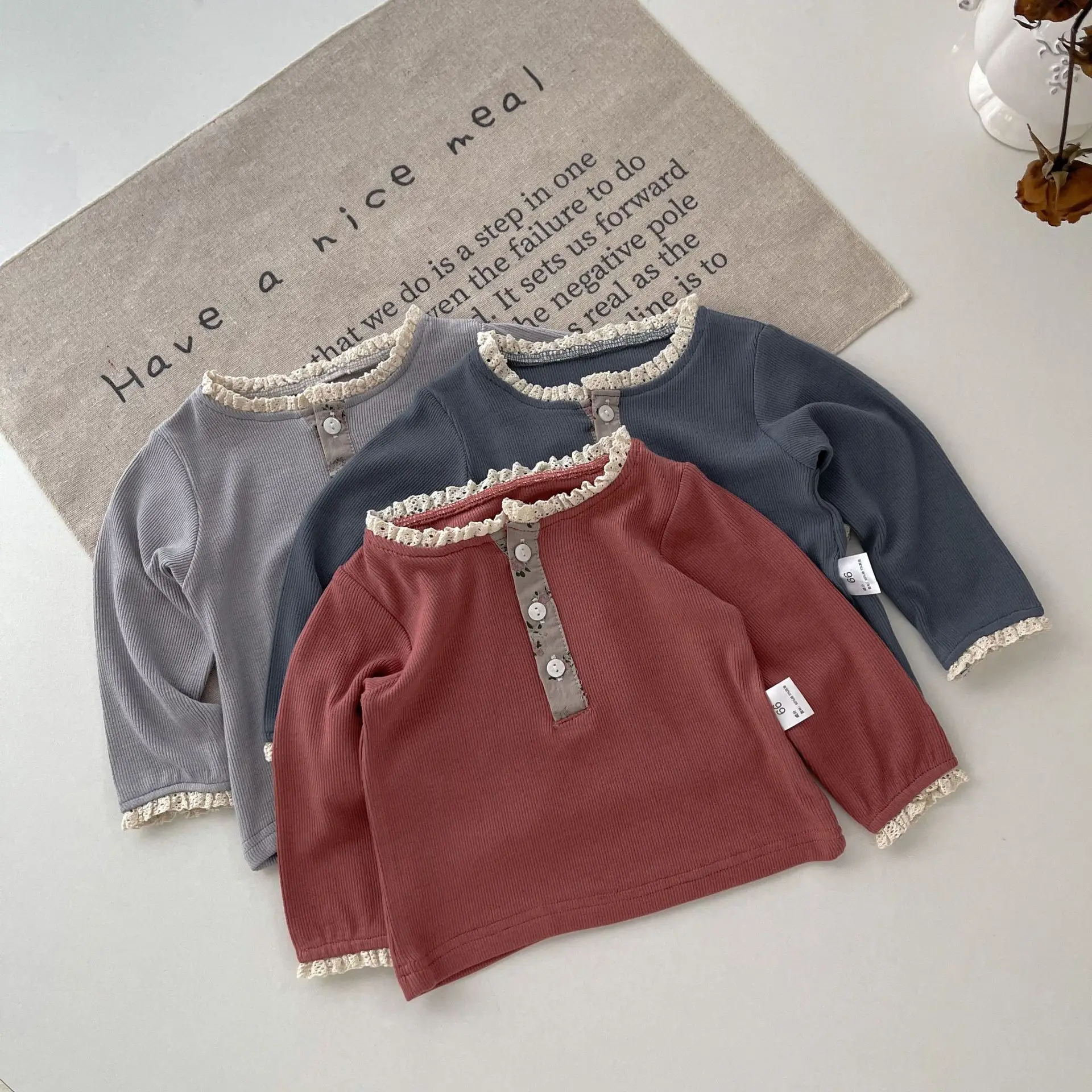 

Undershirt Spring Autumn Flower Edge Collar Pit Strip Elastic Force T-shirt Fragmented Flowers Placket Long Sleeved 2024